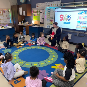 Restorative school Oakmont Elementary classroom with teacher guiding students through a lesson in a circle format